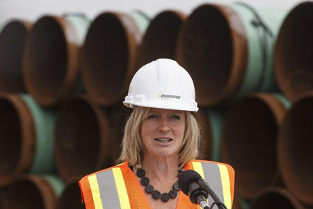 Her other cap has some big holes in it, argues Barry Saxifrage. Alberta Premier Rachel Notley Aug. 10, 2017. Photo by Jason Franson / The Canadian Press)